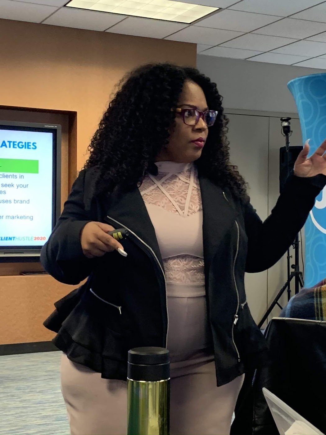 Nina Thomas presenting at Client Hustle, 2020